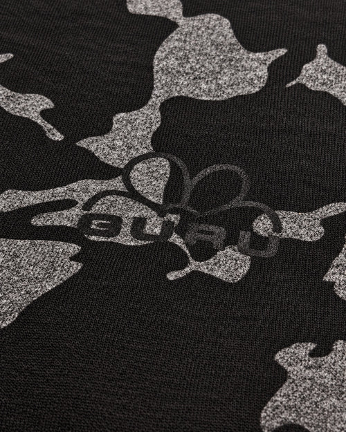 Carica immagine 1 in visualizzazione galleria. Pantalone GURU 1123 nero: dettaglio del logo e del tessuto mimetico