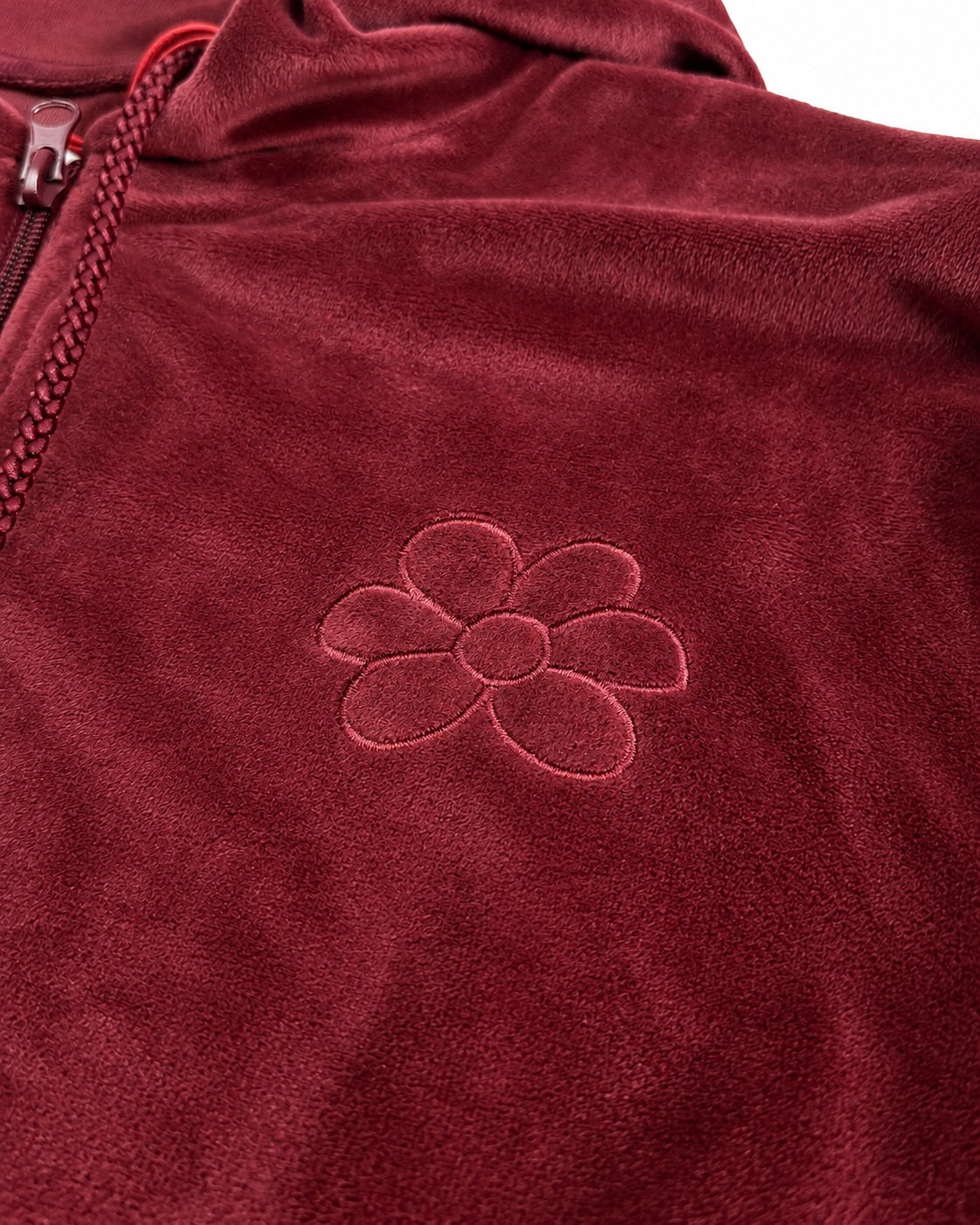 Felpa donna GURU T62G1 05053 bordeaux – dettaglio logo a fiore ricamato tono su tono